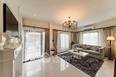 Elegant living room with chandelier and modern decor