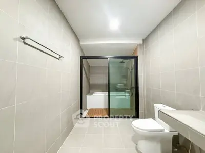 Modern bathroom with sleek design and glass shower enclosure