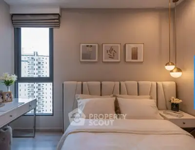 Elegant bedroom with modern decor and city view, featuring a stylish bed and chic lighting.