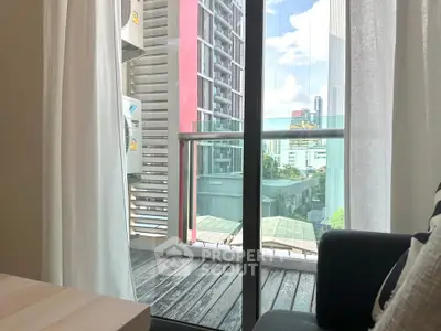 Modern apartment balcony with city view and glass railing