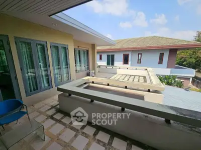 Spacious balcony with modern design and scenic view in a contemporary home