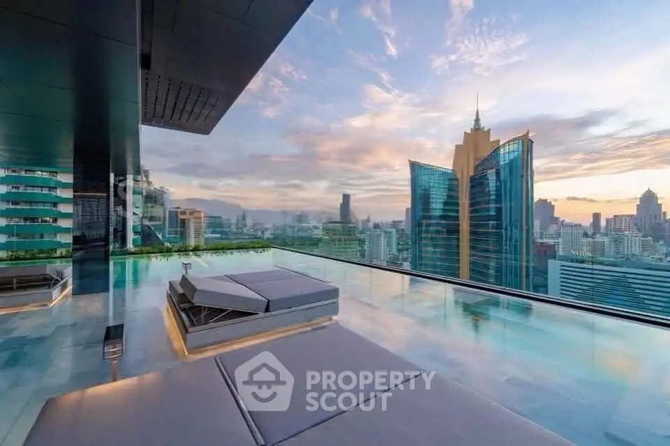 Luxurious rooftop terrace with stunning city skyline view and modern lounge area.