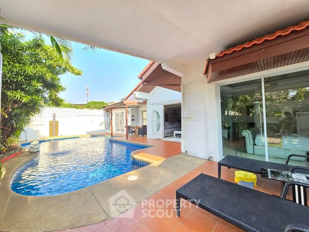 Luxurious villa with private pool and spacious patio, perfect for relaxation and entertaining.