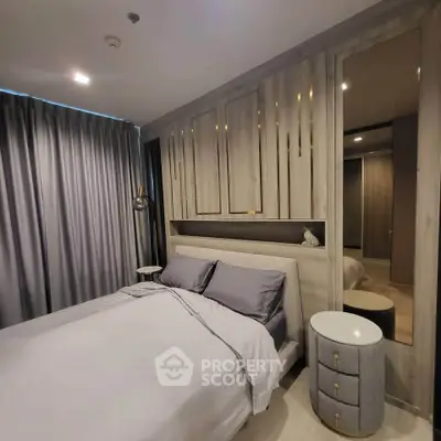 Luxurious modern bedroom with elegant decor and soft lighting
