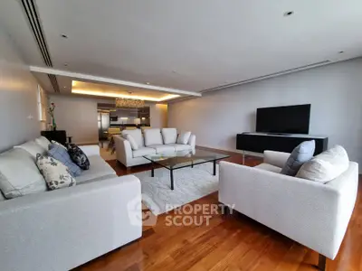 Spacious modern living room with elegant furniture and open layout