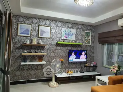 Stylish living room with elegant wallpaper and modern decor