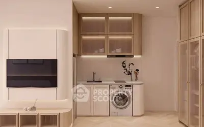 Modern kitchen with integrated washing machine and sleek cabinetry