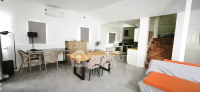 Spacious modern living room with dining area and open kitchen layout