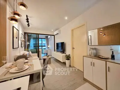 Modern living room with stylish decor and open layout in a contemporary apartment.