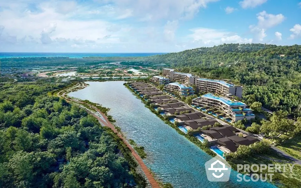 Stunning aerial view of luxury waterfront villas and apartments surrounded by lush greenery and serene waterway.