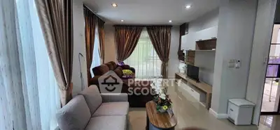 Spacious living room with elegant decor and natural light