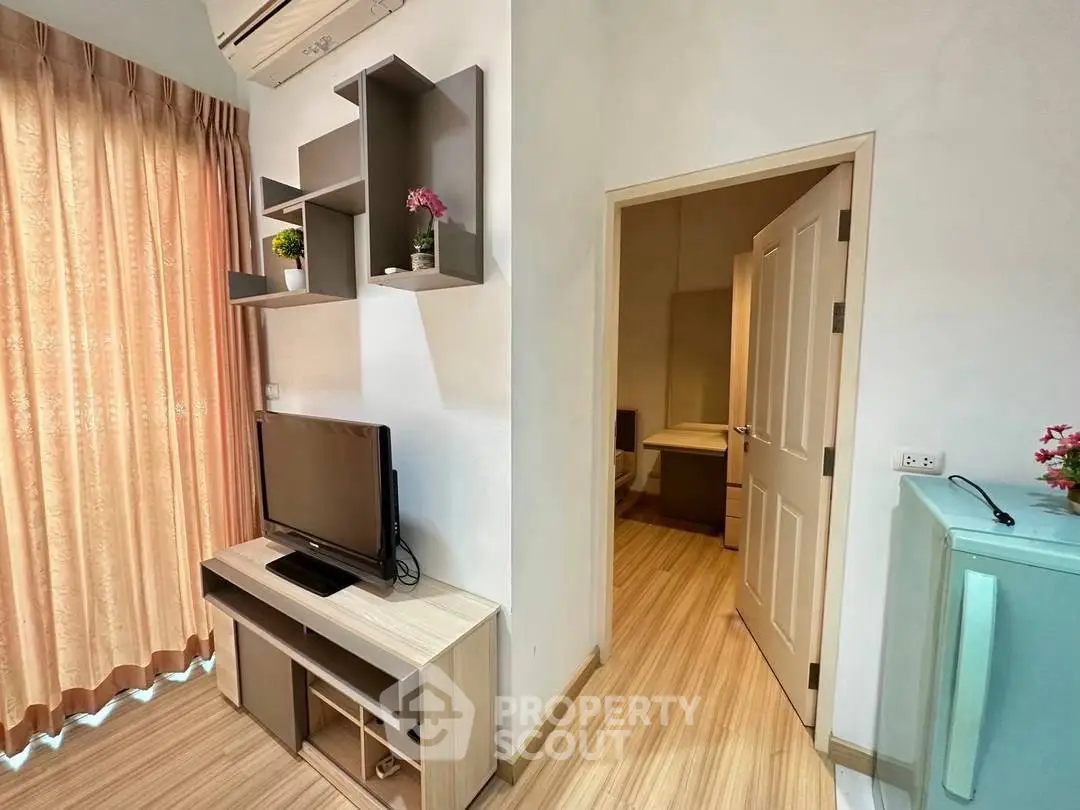 Cozy living room with modern TV stand and stylish shelving