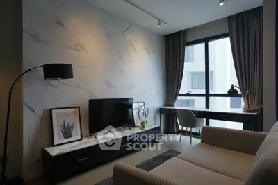 Modern living room with marble accent wall and large window