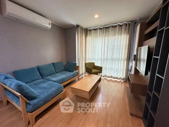 Modern living room with stylish furniture and natural light