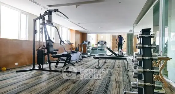 Modern gym with state-of-the-art equipment in a residential building