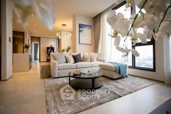 Luxurious modern living room with elegant decor and panoramic city views.