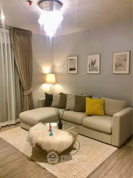 Stylish living room with cozy sofa, elegant decor, and ambient lighting for a warm atmosphere.