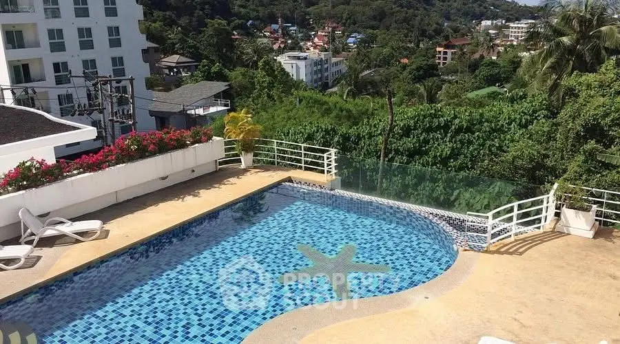 Stunning pool area with scenic views in a tropical real estate setting.