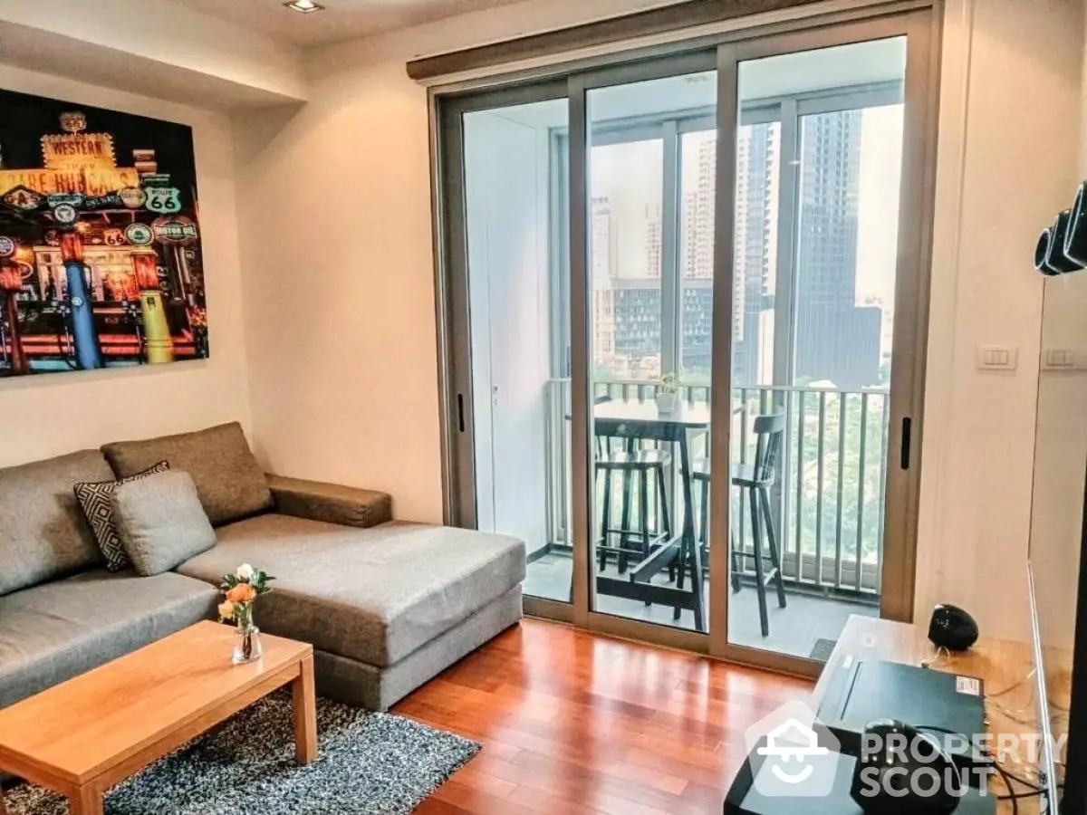 Modern living room with balcony view in high-rise apartment