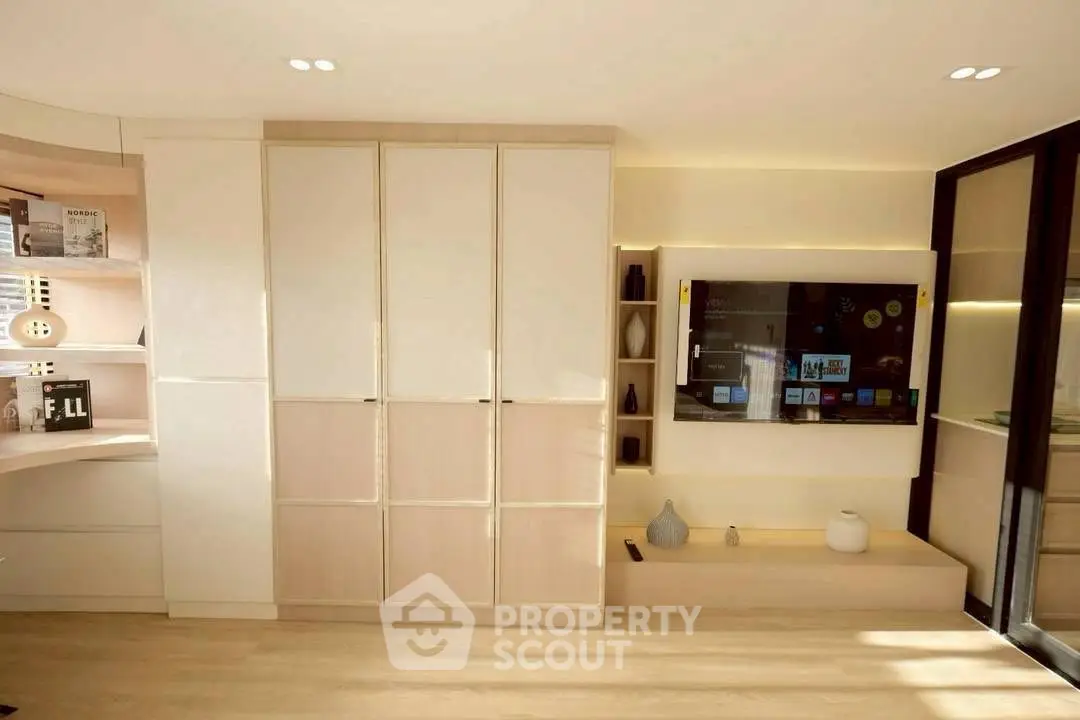 Modern living room with built-in storage and sleek TV setup