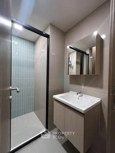 Modern bathroom with sleek design and spacious shower area