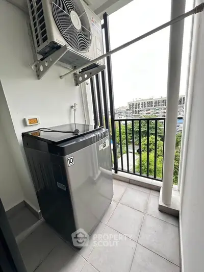 Modern balcony with washing machine and scenic view in urban apartment