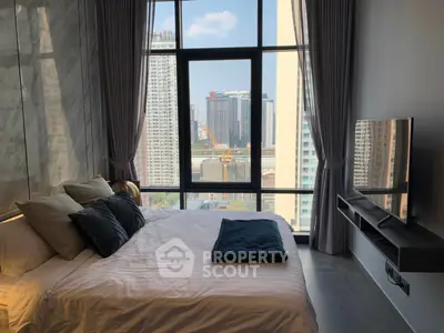 Luxurious bedroom with stunning city view and modern decor