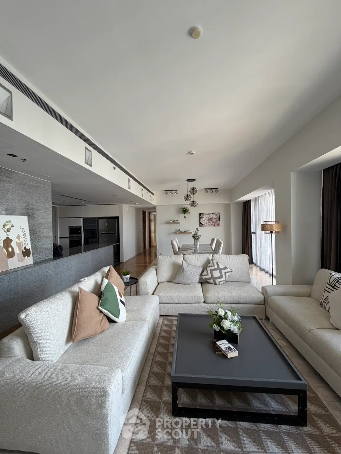 Spacious modern living room with elegant decor and open layout