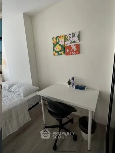 Cozy bedroom with study desk and modern decor