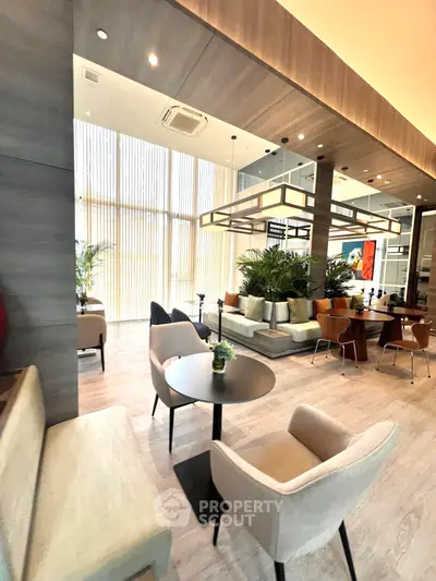 Modern lounge area with stylish seating and contemporary decor, perfect for relaxation and social gatherings.