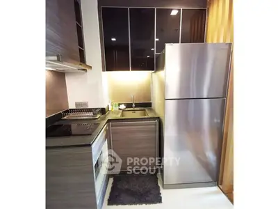 Modern kitchen with sleek appliances and stylish cabinetry