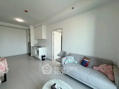 Modern living room with cozy sofa and minimalist decor