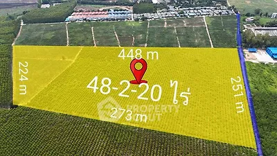 Expansive land plot for sale with clear boundary measurements and prime location.
