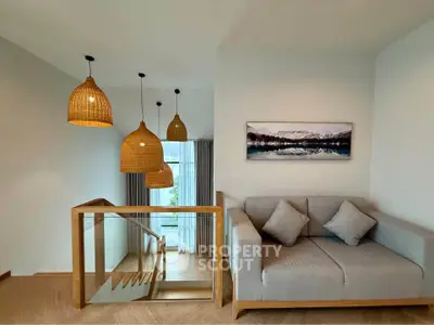 Stylish modern living room with cozy sofa and elegant lighting