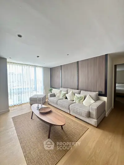 Spacious modern living room with elegant decor and natural light