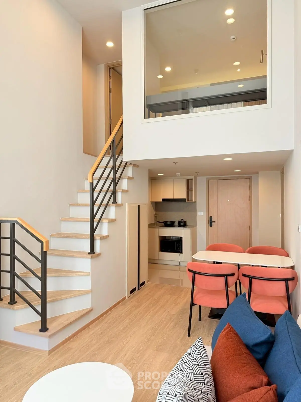 Modern duplex apartment with stylish interior and open kitchen layout