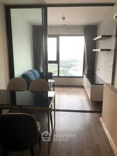 Modern living room with glass partition and scenic view