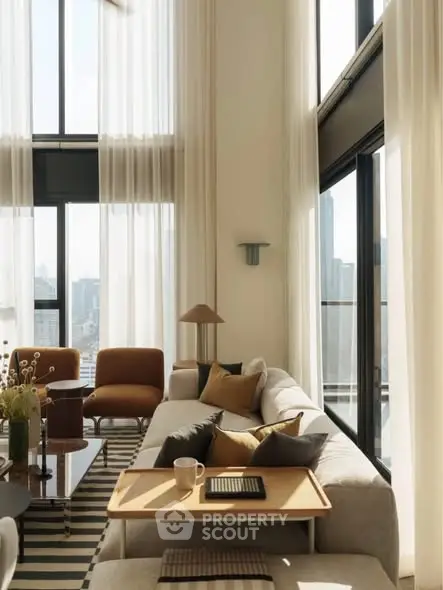 Luxurious high-ceiling living room with panoramic city views and elegant modern decor.