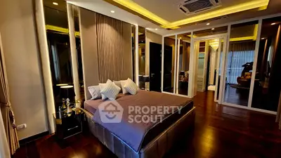 Luxurious modern bedroom with elegant decor and ambient lighting
