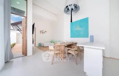 Modern open-plan living space with dining area and stylish decor