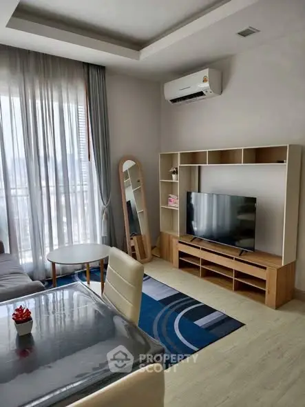 Modern living room with stylish furniture and natural light