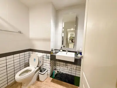 Modern bathroom with sleek design and contemporary fixtures.
