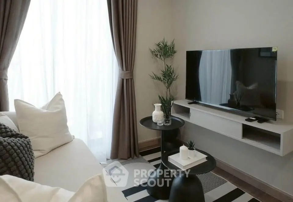 Modern living room with sleek TV setup and stylish decor