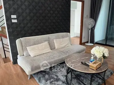 Modern living room with stylish sofa and elegant decor