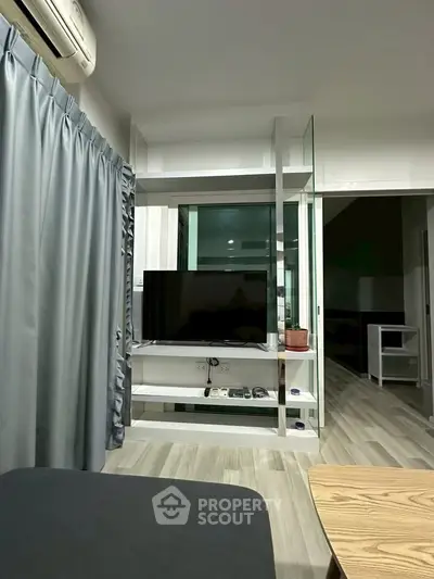 Modern living room with sleek TV stand and stylish decor