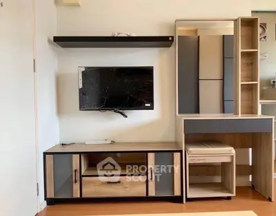 Modern living room with sleek TV stand and storage unit, perfect for stylish urban living.