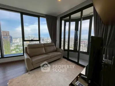 Luxurious living room with panoramic city views and modern furnishings.