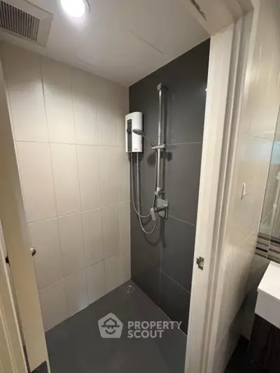 Modern bathroom with sleek shower design and contemporary fixtures