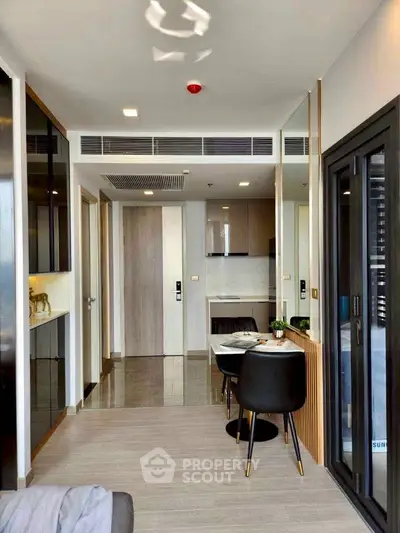 Modern apartment interior with open layout and stylish dining area