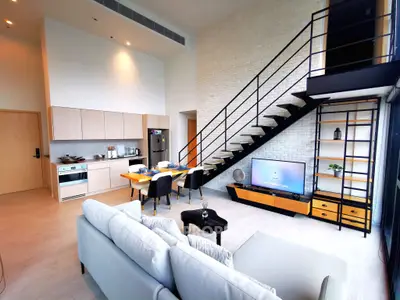 Modern loft apartment with open kitchen and stylish living area